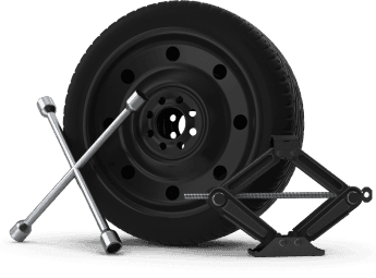 Emergency roadside car kit featuring a black spare tire, silver lug wrench, and mechanical scissor jack on a white background.